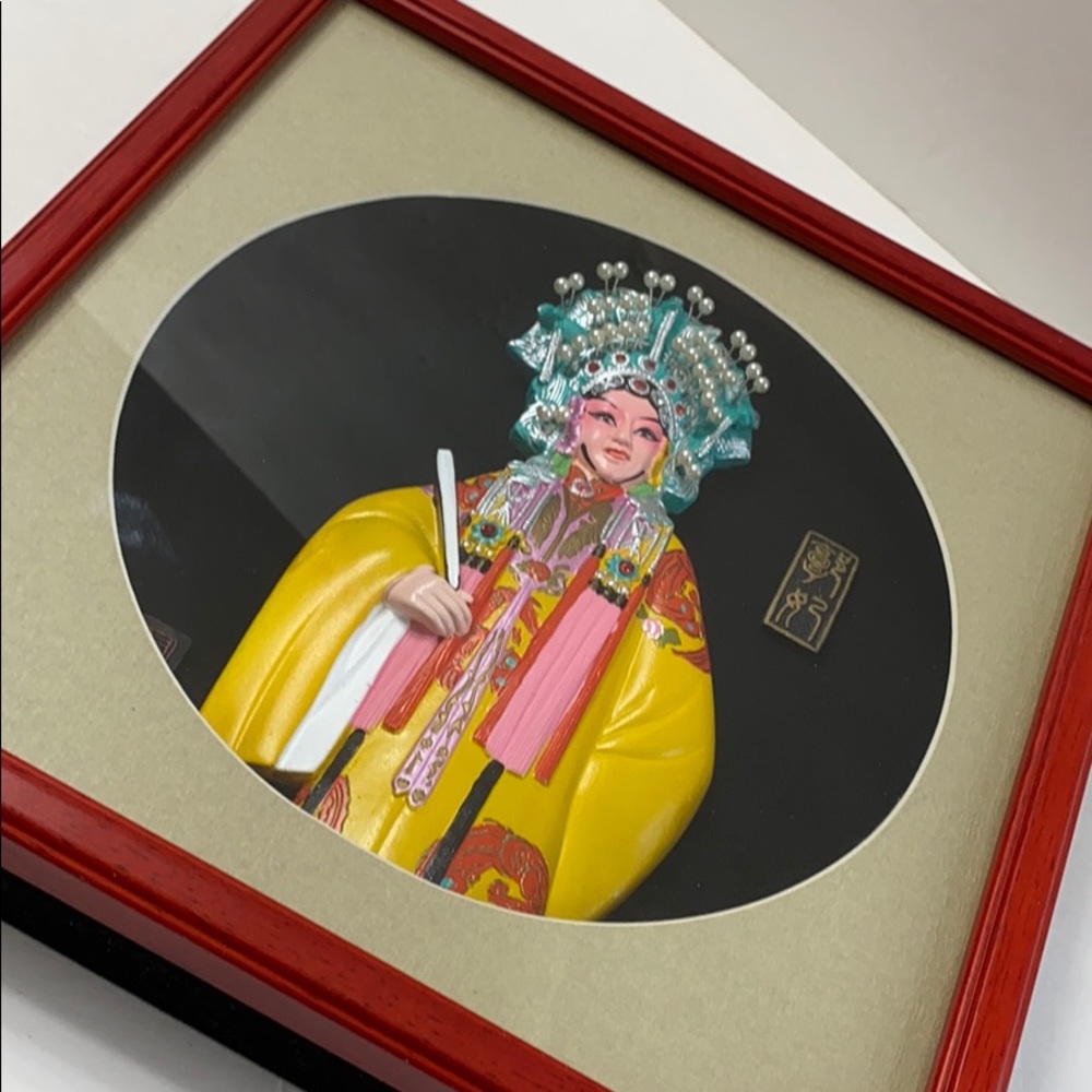 Chinese shadow box depicts the wife of prince Guo